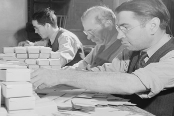 Picture of Blind men working on boxes for Elizabeth Arden cosmetics at the Lighthouse, an institution for the blind in New York City 1944